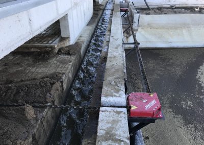 Installation of Jamesway Dura-Chain Alley Scraper in a 220 Foot Long Barn